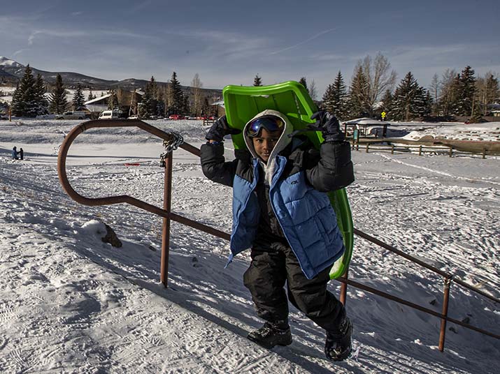 boy with sled